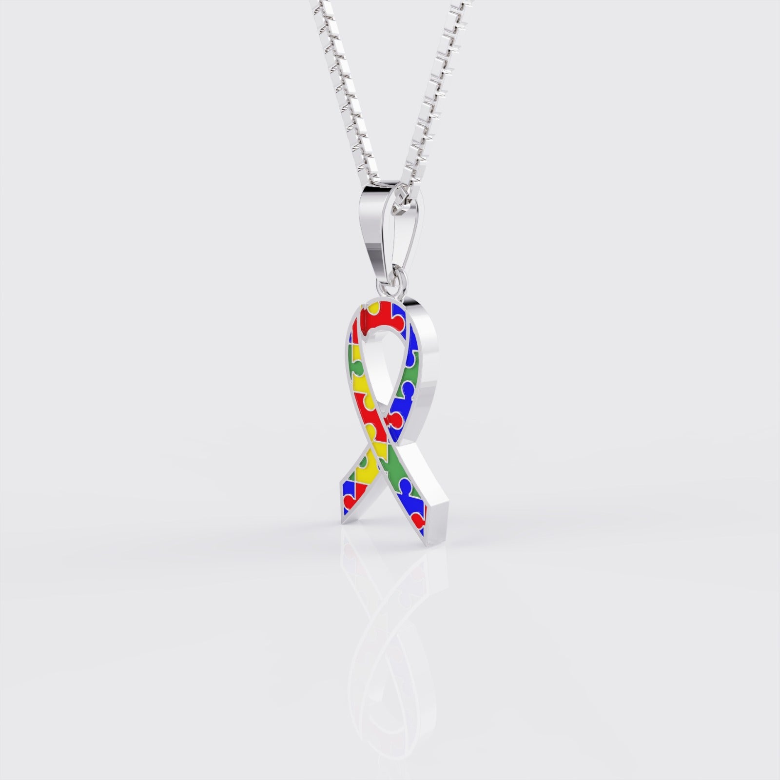 Side profile of white gold autism awareness ribbon pendant necklace.
