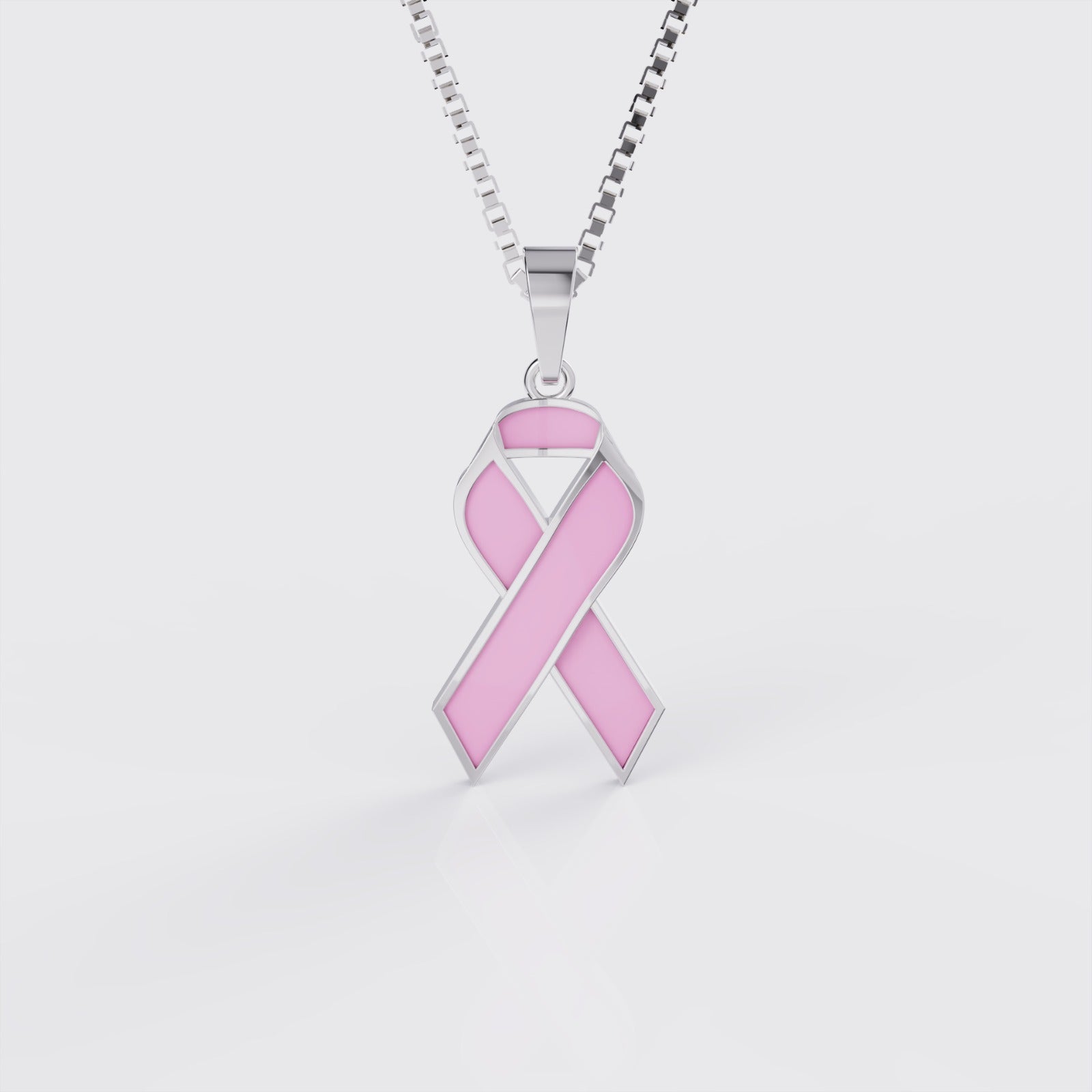White gold breast cancer ribbon pendant necklace with pink enamel, front view.