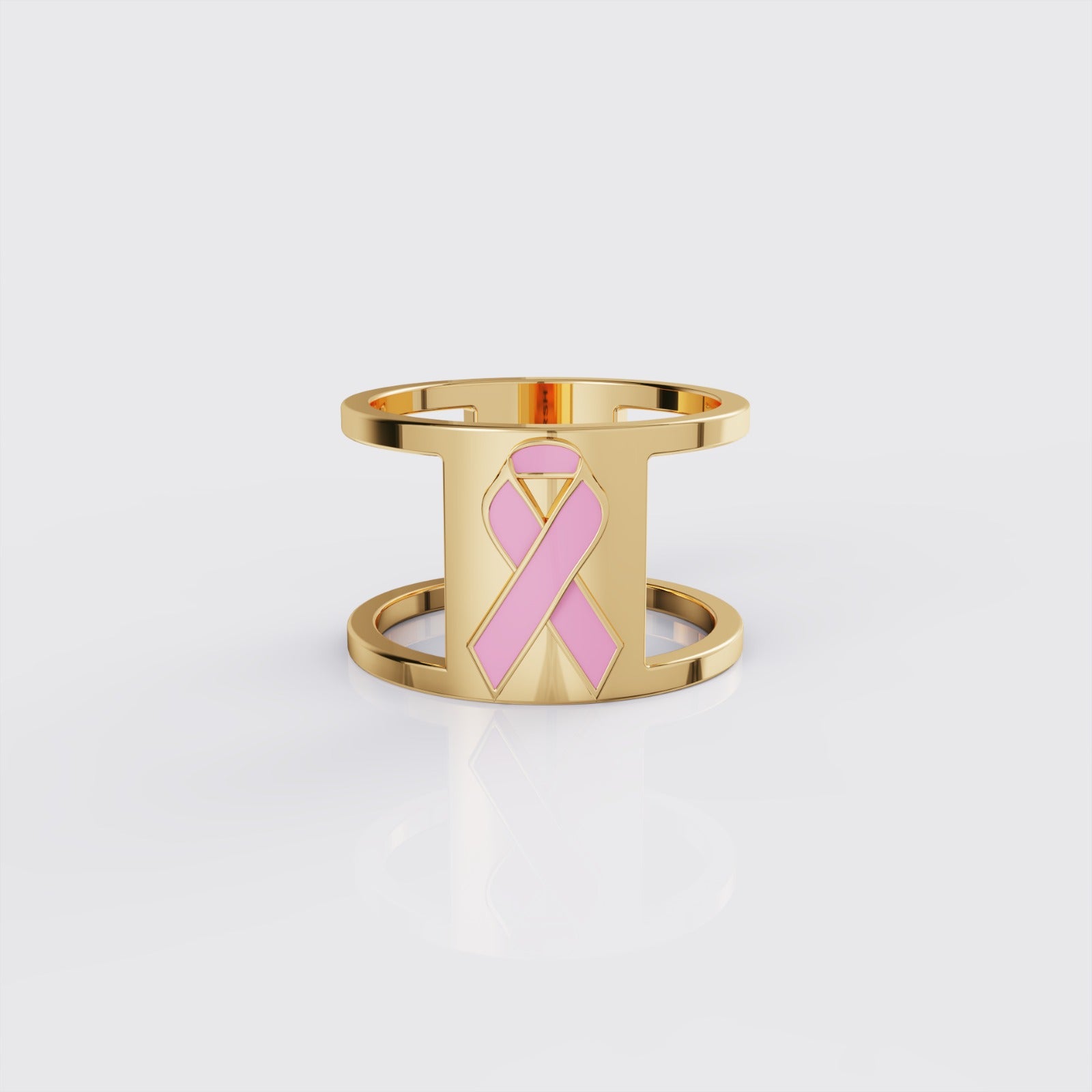 Yellow gold breast cancer ribbon ring with pink enamel, front view.