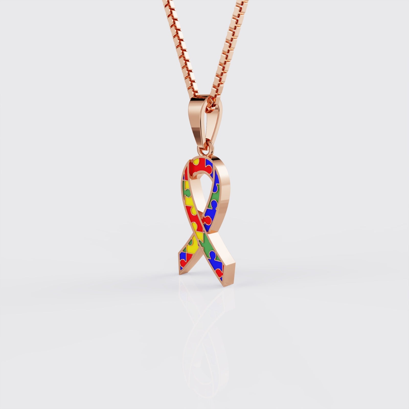 Side profile of rose gold autism awareness ribbon pendant necklace.