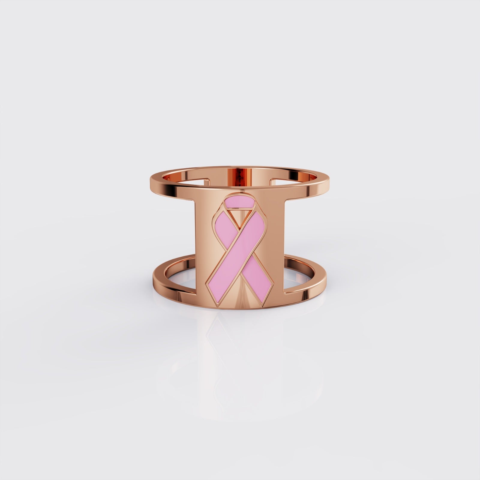Rose gold breast cancer ribbon ring with pink enamel, front view.