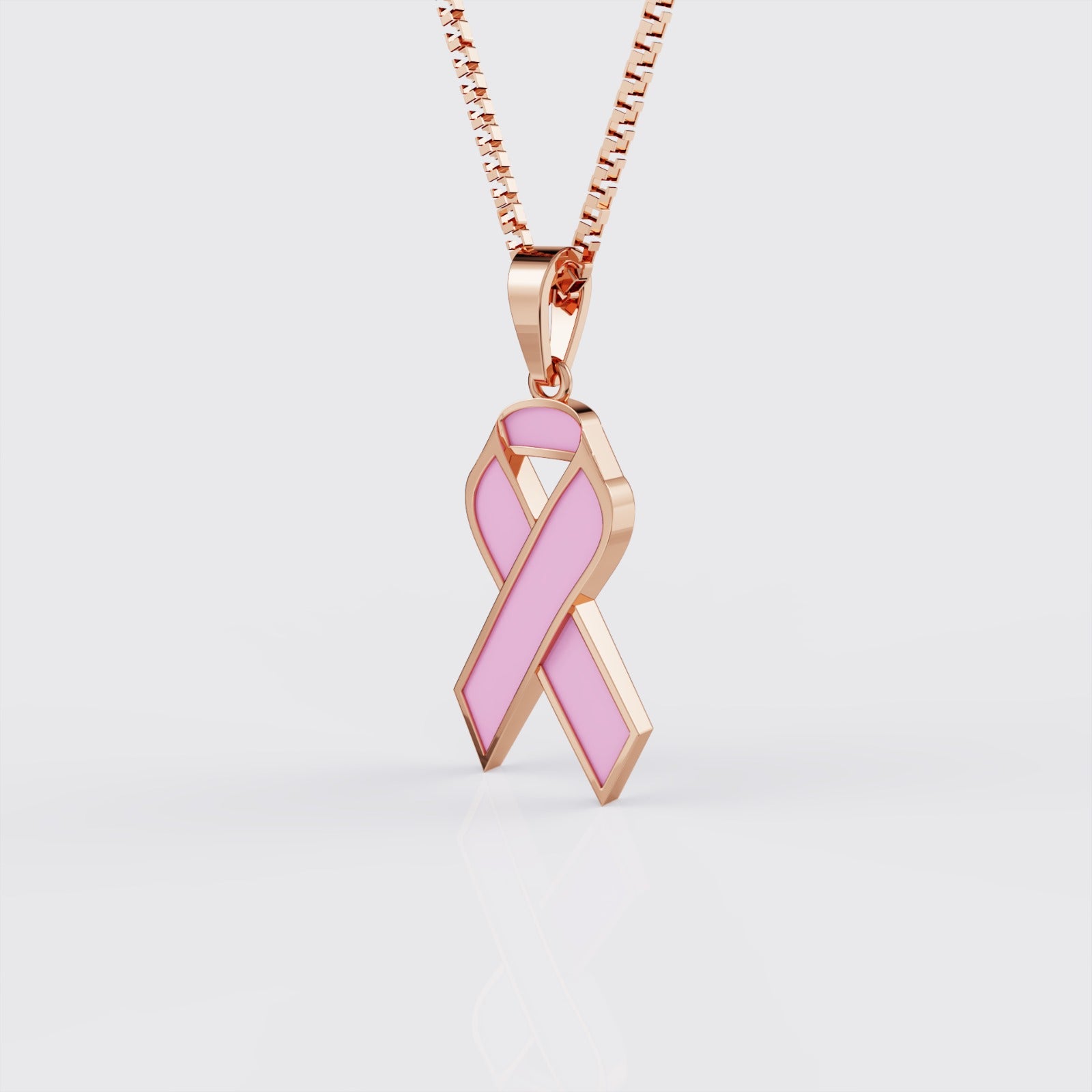 Side view of rose gold breast cancer awareness ribbon pendant necklace.