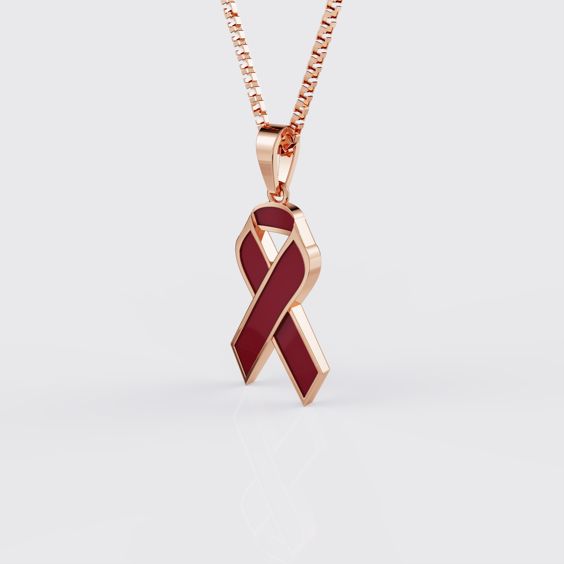 Side profile of rose gold sickle cell awareness ribbon pendant necklace.
