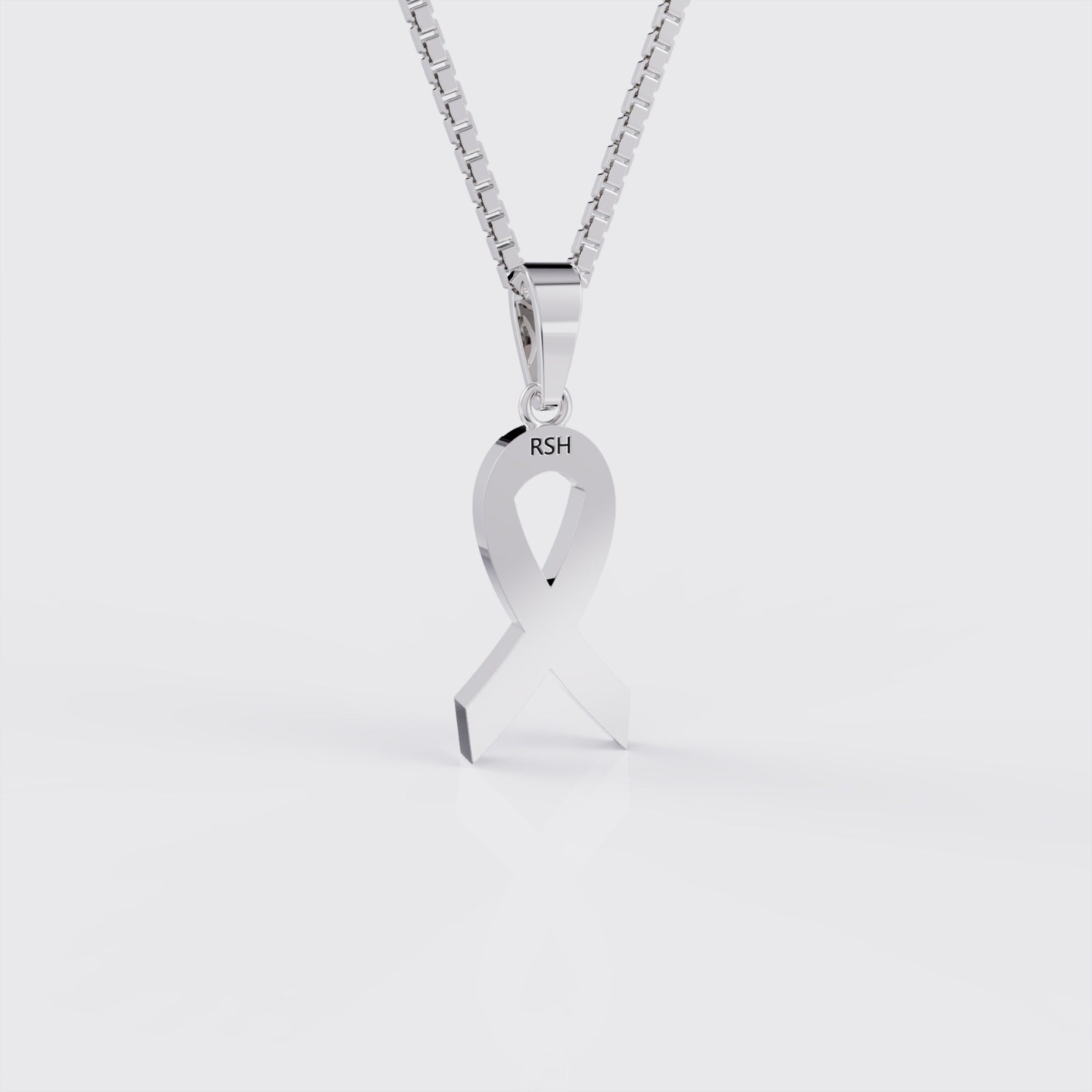 Back view of white gold autism awareness ribbon pendant necklace.