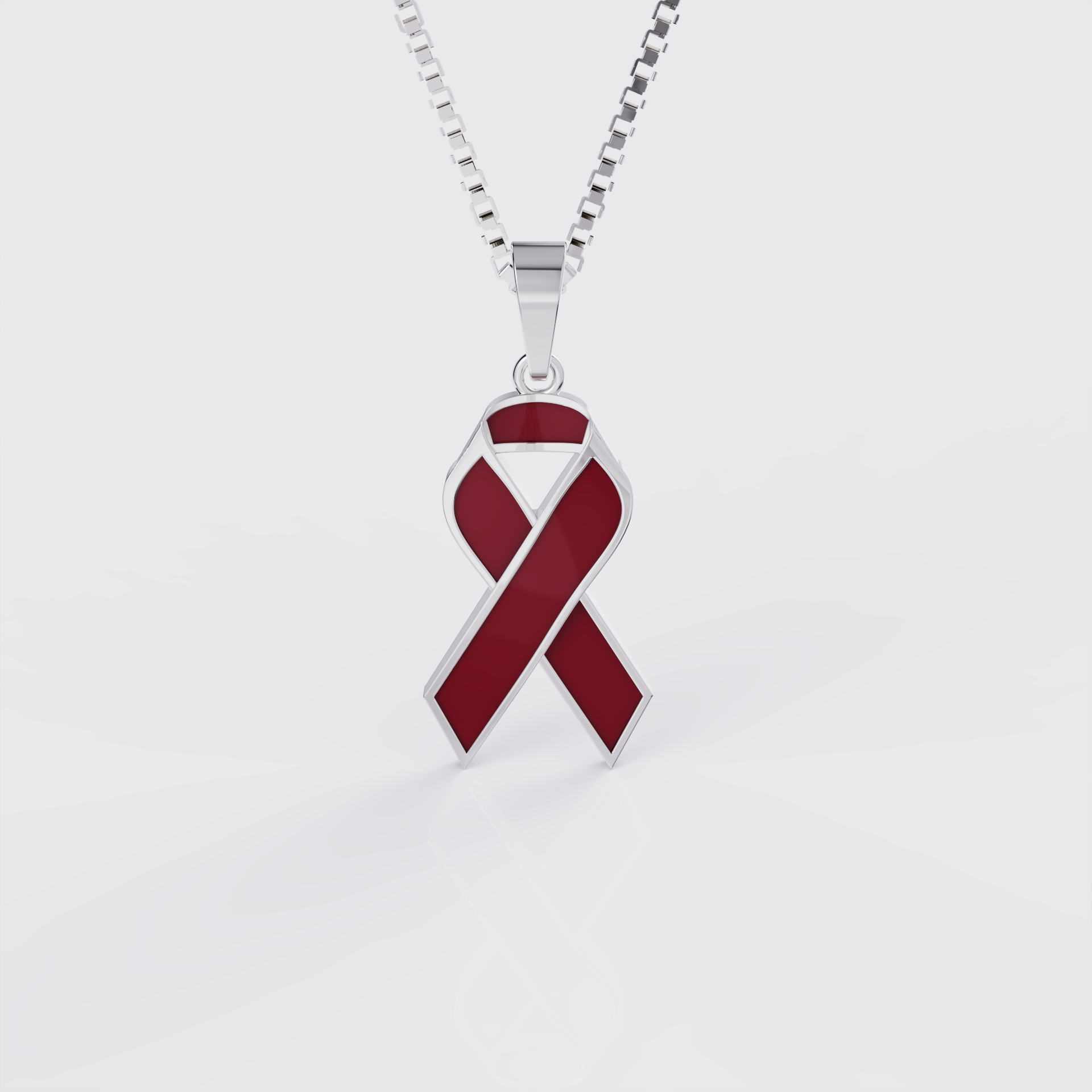 White gold sickle cell awareness ribbon pendant necklace with red enamel, front view.
