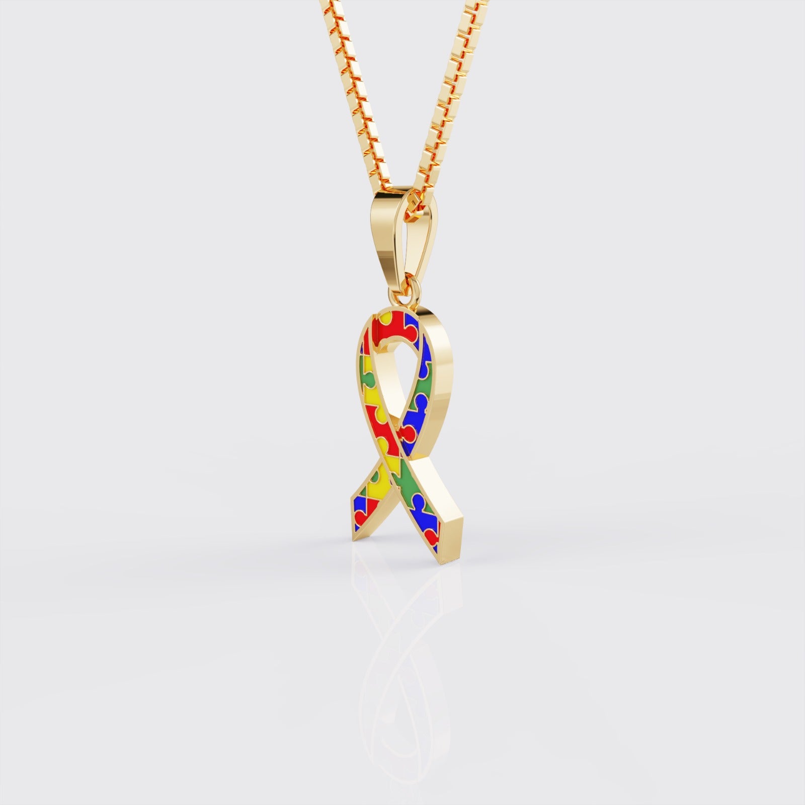 Side view of yellow gold autism awareness ribbon pendant.