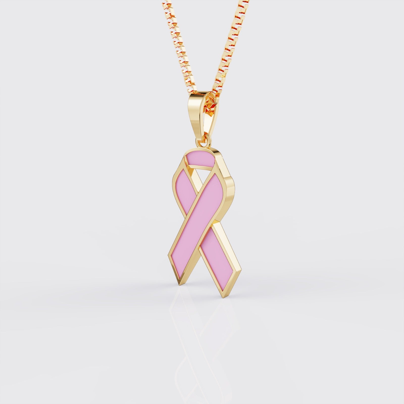 Side view of yellow gold breast cancer awareness ribbon pendant necklace.